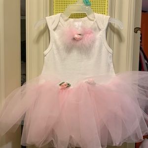 Adorable little dress by Carter’s pink&white tutu style,label says sz. 6…